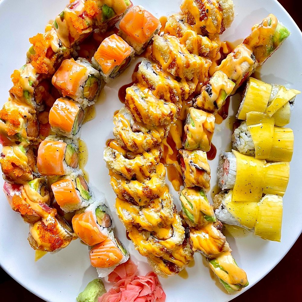 Ono Grill - Left to right: Tornado Roll, King Salmon Roll, Fire Roll, Happy Roll, and Golden Mango Roll - Japanese Near Me - Anniston, Alabama