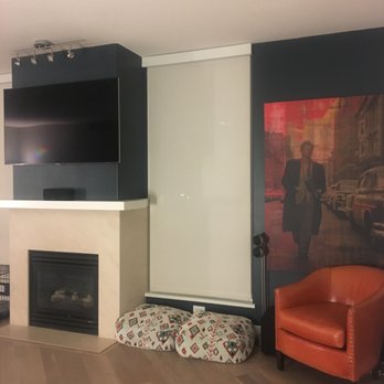 Best Choice Painting Improvements - After: Accent wall around the fireplace.  Downtown San Diego Condo review by Jillian - Painters Near Me - Napa, California