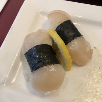 Sushi Zone - Scallop Nigiri (special). Pricey at $12.50, and left something to be desired. I'd skip this in favor of the rolls next time. - Sushi Bars Near Me - San Francisco, California