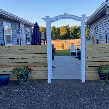 A J construction - Patio privacy fence with arch way - Lawn Services Near Me - Martin, Michigan A J construction - Patio privacy fence with arch way - Lawn Services Near Me - Martin, Michigan