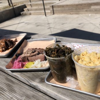 Wood's Chapel BBQ - Sliced brisket, pulled pork, mac n cheese, braised greens - Barbeque Near Me - Atlanta, Georgia