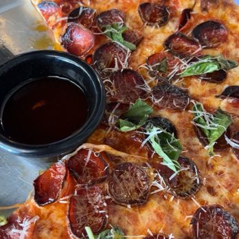 Made From Skratch Pizza Kitchen - Pizza with hot honey on the side. - Pizza Near Me - Redlands, California