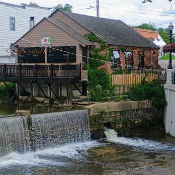 ETalian - Back deck on the building hangs over the river - Pizza Near Me - Chagrin Falls, Ohio