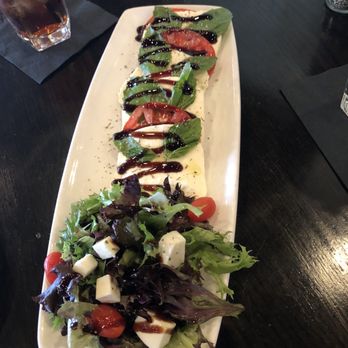 The Republic Grille - Caprese Salad. So good with fresh mint leaves - Southern Near Me - Spring, Texas The Republic Grille - Caprese Salad. So good with fresh mint leaves - Southern Near Me - Spring, Texas