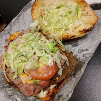 Gil Tacos - Inside the Cubana Torta. Breaded steak, chorizo, egg, cheese, a hot dog, and ham. - Mexican Near Me - Indianapolis, Indiana Gil Tacos - Inside the Cubana Torta. Breaded steak, chorizo, egg, cheese, a hot dog, and ham. - Mexican Near Me - Indianapolis, Indiana
