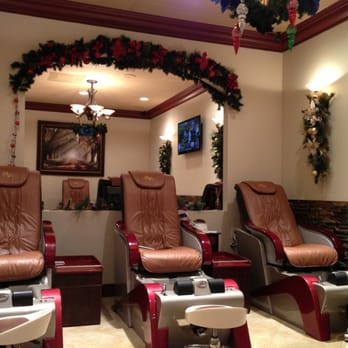 Omega Nails & Spa - Pedicure stations! They really got into the Christmas spirit! Beautifully decorated salon! - Nail Salons Near Me - Cooper City, Florida