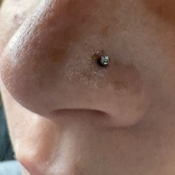 Ultimate Art Form - Nostril piercing on left side