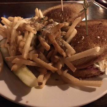 Firebird Tavern - Corned beef sandwich with Poutine fries - New American Near Me - Detroit, Michigan Firebird Tavern - Corned beef sandwich with Poutine fries - New American Near Me - Detroit, Michigan