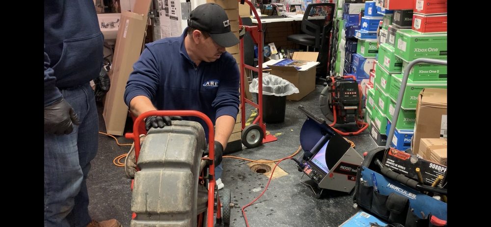 Slide of ART Drain Cleaning Services