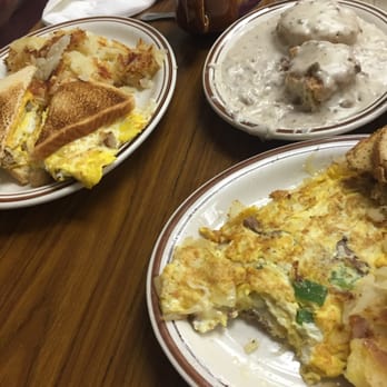 The Mason Grill - breakfast sandwich with sausage(right), biscuis and gravy(middle), cheese steak omelet(left) - American Near Me - Mason, Ohio