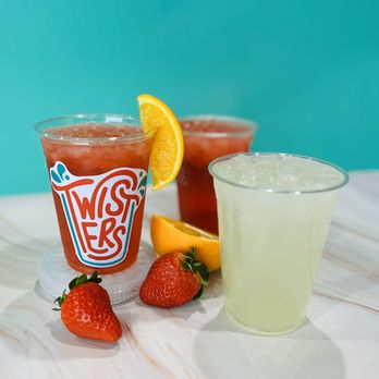 Twisters Soda Bar - two drinks with strawberries and lemon wedges - Desserts Near Me - Pendleton, Indiana