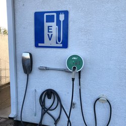 Shell Fast Track & Fuel - Electric vehicle fueling station on the left (west) side of the building near the back, including a proprietary Tesla charge.