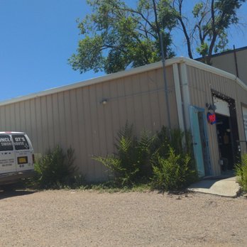 Uncle DT's Kitchen - the restaurant building from the front corner of the parking lot, with catering van parked next to the building - Barbeque Near Me - Santa Fe, New Mexico Uncle DT's Kitchen - the restaurant building from the front corner of the parking lot, with catering van parked next to the building - Barbeque Near Me - Santa Fe, New Mexico