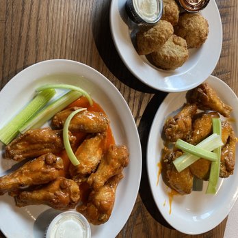 Anchor Bar - Mild and medium wing sauce. Fried mac & cheese balls - Sports Bars Near Me - Round Rock, Texas