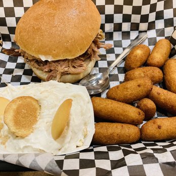 Due South BBQ - Trough: Jumbo Pork Sandwich with Hush-Puppies and Banana Puddin' w/ Organic Bananas. - Southern Near Me - Roanoke, Virginia Due South BBQ - Trough: Jumbo Pork Sandwich with Hush-Puppies and Banana Puddin' w/ Organic Bananas. - Southern Near Me - Roanoke, Virginia