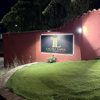 L'Altra Tappa - The entrance at night. - Italian Near Me - Ciampino, RM