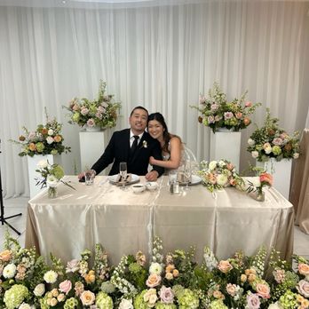 Cristina's Flowers - Sweetheart table, repurposed from ceremony - Florists Near Me - Long Beach, California Cristina's Flowers - Sweetheart table, repurposed from ceremony - Florists Near Me - Long Beach, California