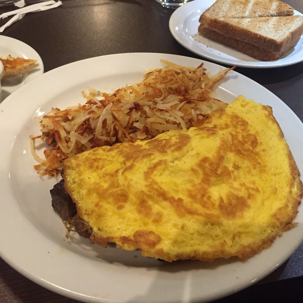 Philly cheesesteak omelette with a side of bread of your choice and loaded shredded hash.