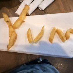 Brewsters Neighborhood Grill - The kids spelled out YUM with fries