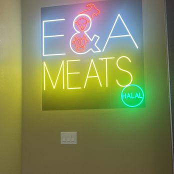 E & A Meats - neon sign on wall - Butcher Near Me - San Antonio, Texas