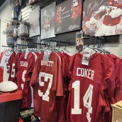 Wolfe Den Collectibles - Lots of Bama memorabilia