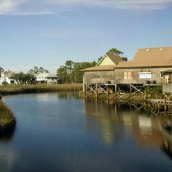 Nestled along the shore of the beautiful Gulf Shores bayou. (This photo is from inside the restaurant looking out.)