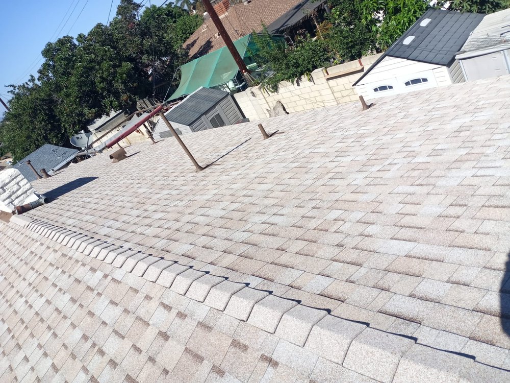 Slide of All American Construction and Roofing