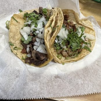 El Dorado - Tacos: carne asada (left) and carnitas (right) with onions and cilantro - Mexican Near Me - Duluth, Georgia El Dorado - Tacos: carne asada (left) and carnitas (right) with onions and cilantro - Mexican Near Me - Duluth, Georgia
