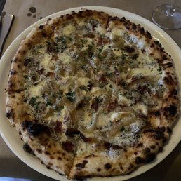 The Ciao Pizza truffle cream, fresh mozzarella, bacon, caramelized onions The Ciao Pizza truffle cream, fresh mozzarella, bacon, caramelized onions
