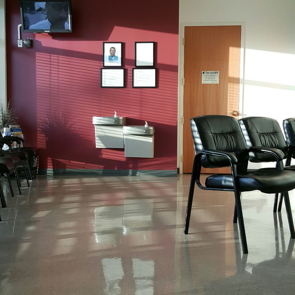The Mini ER - One small TV on wall running health programming - Urgent Care Near Me - Orlando, Florida