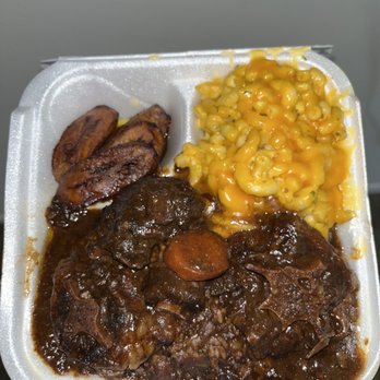 Irie Jerk Hut - Oxtail dinner with mac and cheese and plantains sides - Salad Near Me - Richton Park, Illinois
