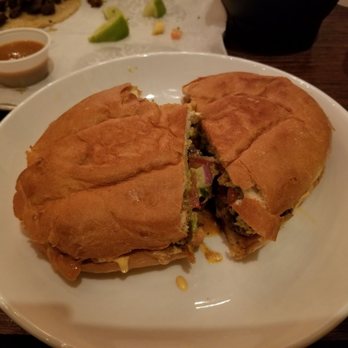 Taco Mucho - Steak torta with a bite out of it - Tacos Near Me - Oak Park, Illinois Taco Mucho - Steak torta with a bite out of it - Tacos Near Me - Oak Park, Illinois