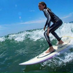 Gracie shredding at crabs during her 3rd summer at Chas Surf School