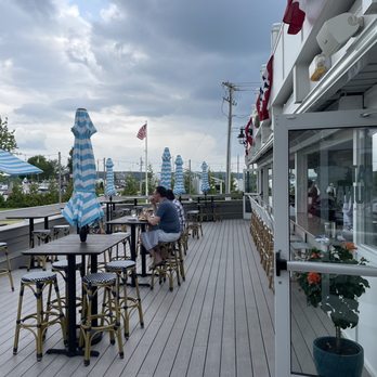 Fat Tuna - The deck! The bar opens out onto it, for front row seats to the raw bar prep - Seafood Near Me - Waterford, Connecticut Fat Tuna - The deck! The bar opens out onto it, for front row seats to the raw bar prep - Seafood Near Me - Waterford, Connecticut