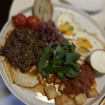 Joon - Breakfast platter with lamb shalk, potatoes, 2 eggs, tuom, grilled onion and tomato. - Persian/Iranian Near Me - Vienna, Virginia Joon - Breakfast platter with lamb shalk, potatoes, 2 eggs, tuom, grilled onion and tomato. - Persian/Iranian Near Me - Vienna, Virginia