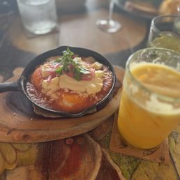 Huevos rancheros and Be Healthy drink.