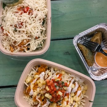 Tacoria - Burrito Boxes and Golden Avocado (2 Pieces) - Tex-Mex Near Me - New Brunswick, New Jersey Tacoria - Burrito Boxes and Golden Avocado (2 Pieces) - Tex-Mex Near Me - New Brunswick, New Jersey