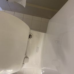 The cap from the toilet seat is gone
