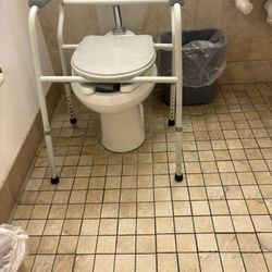 Broken potty chair and rusted