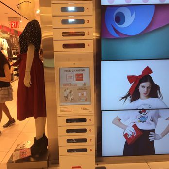 UNIQLO - Cell phone charging station - Women's Clothing Near Me - New York, New York