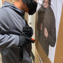 Paladin Tactical US - Student in practicing extreme close quarters shooting in safe environment.