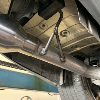Downtown Muffler Service - Gorgeous brackets near the tips which can be see from the back of the car. - Auto Repair Near Me - Hayward, California