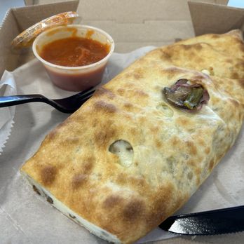 Elizabeth's Pizza - Lunch special steak calzone w/mushroom, onion, & peppers (small pizza box for size comparison) - Pizza Near Me - Thomasville, North Carolina Elizabeth's Pizza - Lunch special steak calzone w/mushroom, onion, & peppers (small pizza box for size comparison) - Pizza Near Me - Thomasville, North Carolina