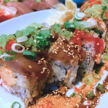 Saburo's - Rainbow roll, spiced sauce that's rich and soaks into the fish and rice. - Japanese Near Me - Portland, Oregon Saburo's - Rainbow roll, spiced sauce that's rich and soaks into the fish and rice. - Japanese Near Me - Portland, Oregon