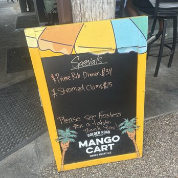 Riviera Bar and Grill - Specials sign by the outdoor bar - Bars Near Me - Punta Gorda, Florida