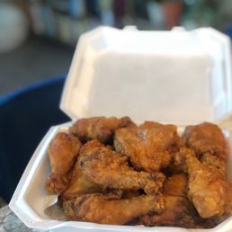 chicken wings in a styrofoam container