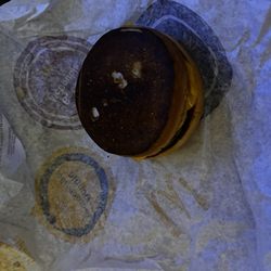 Burnt burger bread on my double cheeseburger. I'm not even sure if the remainder of the food is okay I'm too disappointed to check