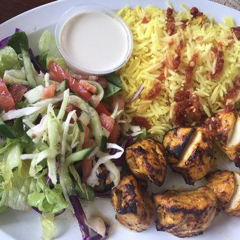 Sultan Kebab & Bakery - Chicken kabob salad with hot sauce of the rice (I put it on there ) - Mediterranean Near Me - Norridge, Illinois Sultan Kebab & Bakery - Chicken kabob salad with hot sauce of the rice (I put it on there ) - Mediterranean Near Me - Norridge, Illinois