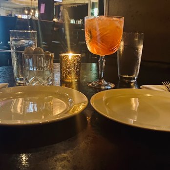 Char Steakhouse & Oyster Bar - a glass of wine and a plate of food - Steakhouses Near Me - Springfield, Missouri Char Steakhouse & Oyster Bar - a glass of wine and a plate of food - Steakhouses Near Me - Springfield, Missouri