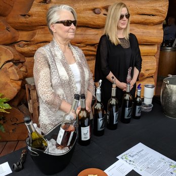 Zerba Cellars - two women standing behind a table full of wine bottles - Wineries Near Me - Milton-Freewater, Oregon